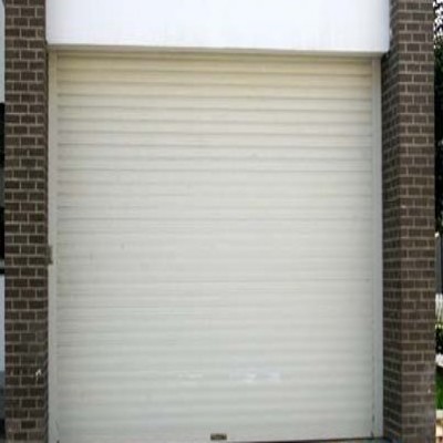 通州區(qū)安裝電動卷簾門北京東關(guān)安裝電動卷簾門更換電機